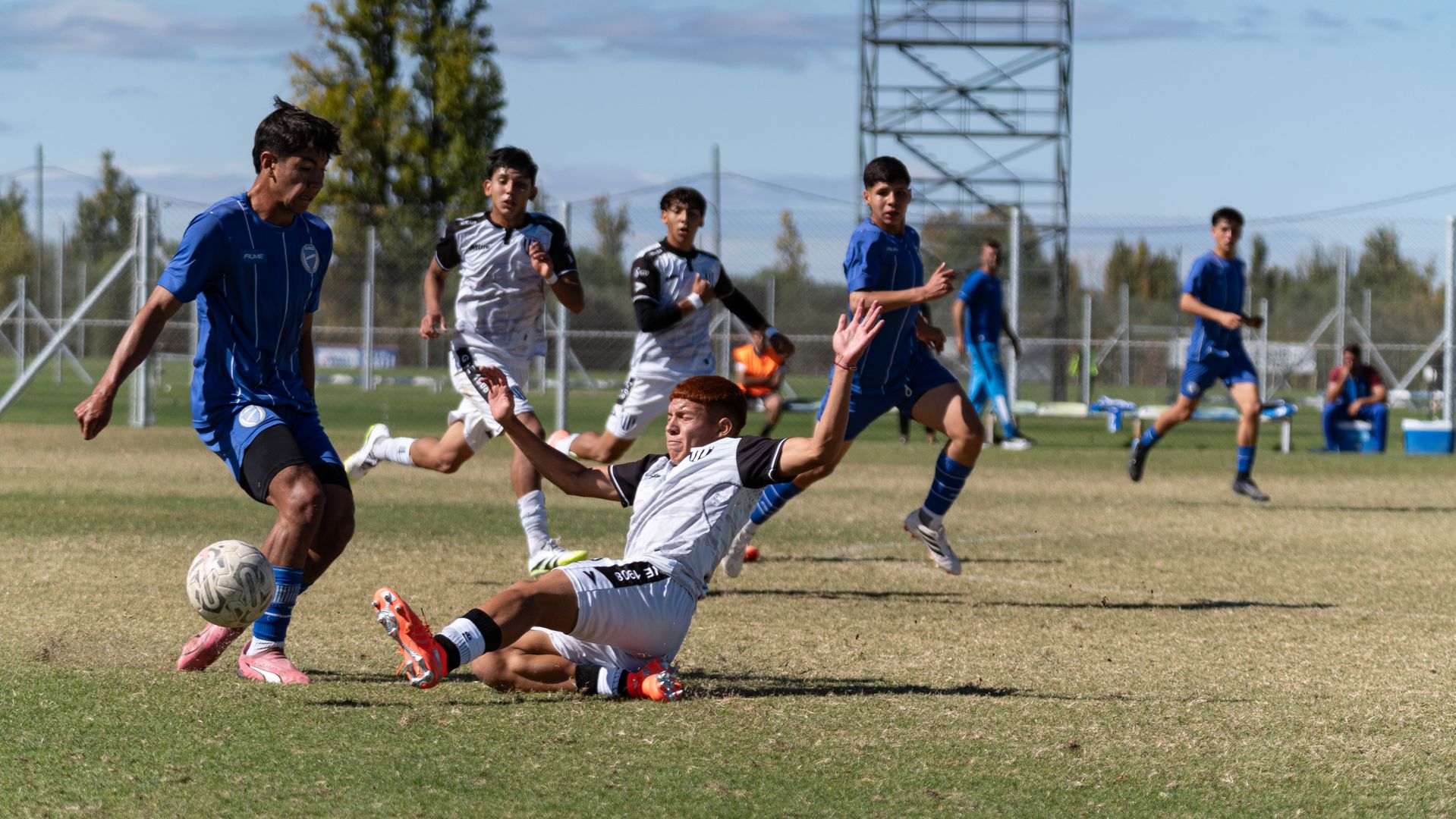 Youth soccer slide tackle